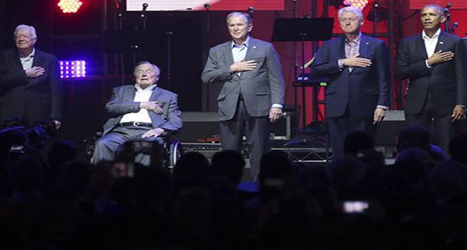 ঝড়ে বিধ্বস্তদের পাশে দাড়াতে একই মঞ্চে যুক্তরাষ্ট্রের সাবেক ৫ প্রেসিডেন্ট।।   